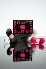 Bow Bow wearable in black, pink and white, with Sauce branding